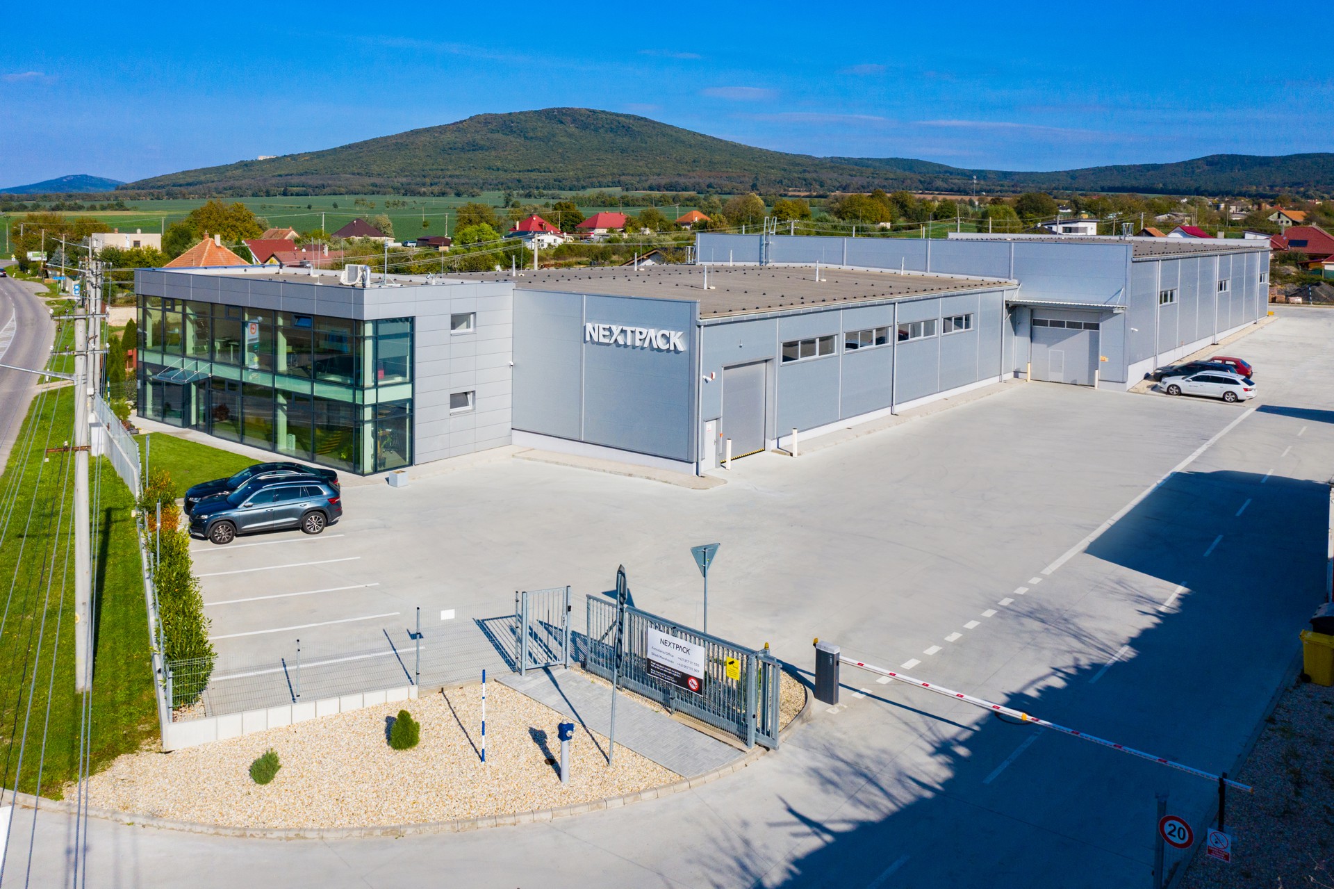 Social administrative building, production hall and storage hall